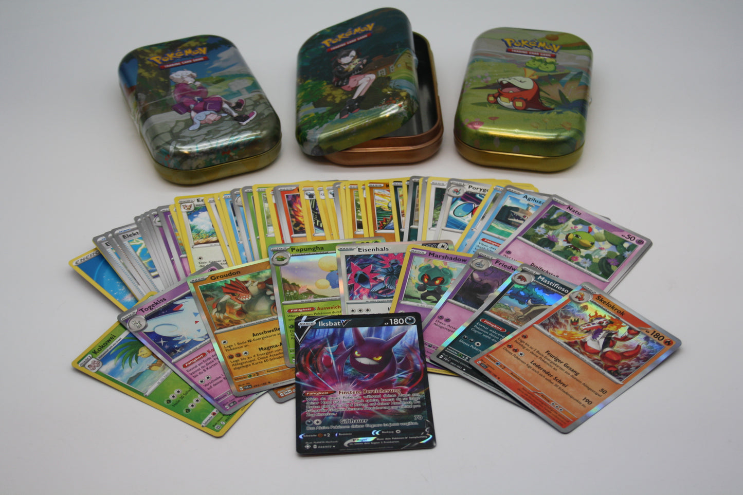 Pokémon - Mystery Box - 60 Karten +1 V/EX Karte - inkl. zuf. Mini Tindose